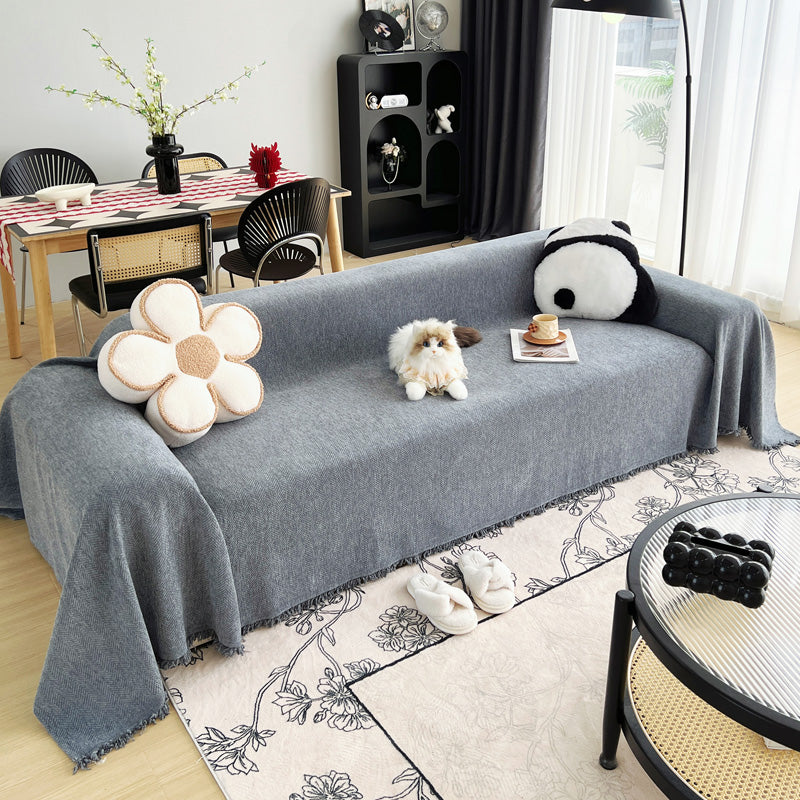 Gewebter Sofaüberwurf Steingrau, über ein Sofa gelegt