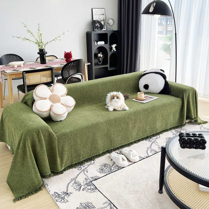 Gewebter Sofaüberwurf Olivgrau, über ein Sofa gelegt