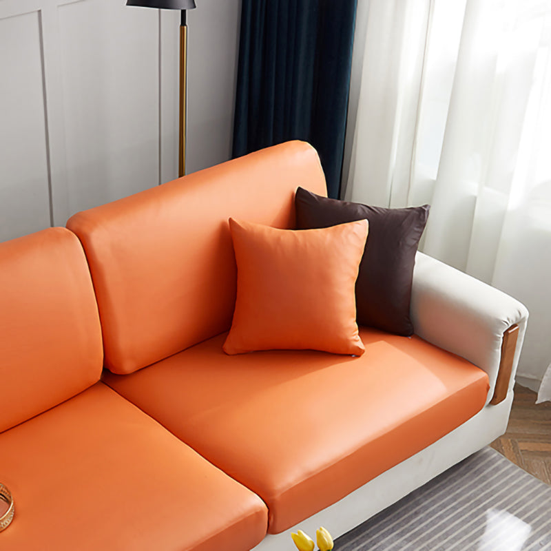 Kissenbezug aus Kunstleder 40 × 40 cm — 1 Stück, Mandarine, auf einem Sofa