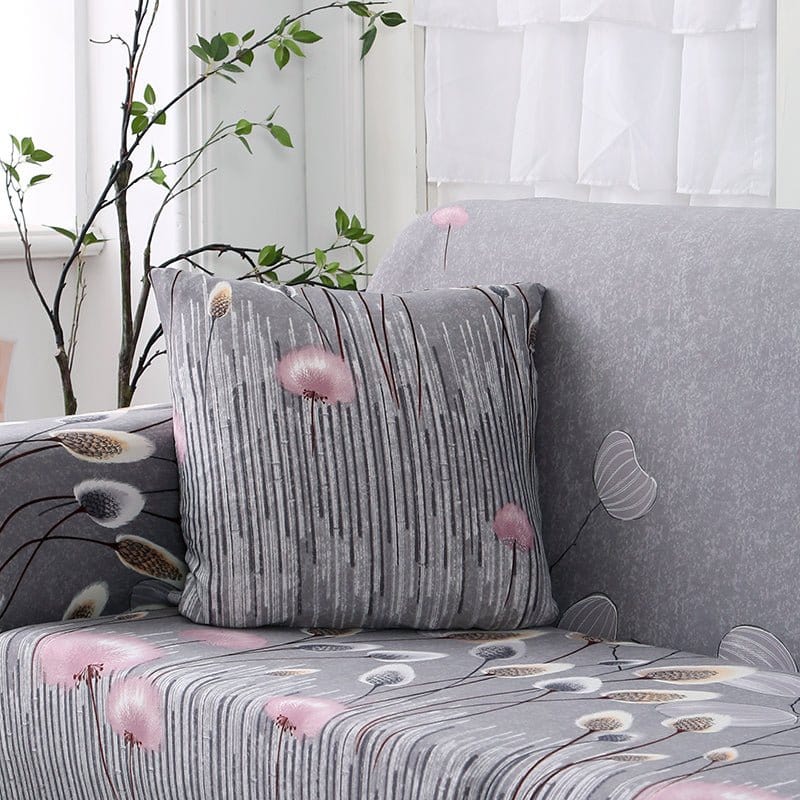Wasserabweisende Kissenbezüge 45 × 45 cm — 2er-Set, Grau mit rosa Pompons, auf einem Sofa